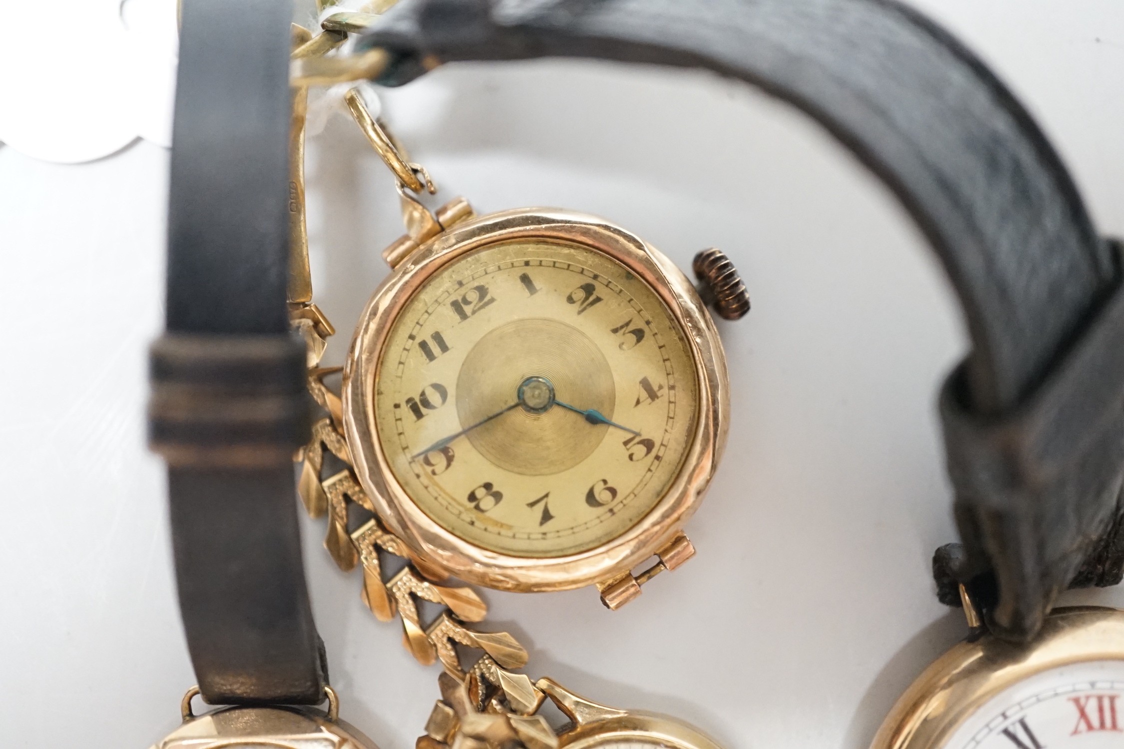 A lady's 9ct gold Timex manual wind wrist watch, on a 9ct gold bracelet, gross weight 1.8 grams and three other yellow metal wrist watches including a 9ct gold Waltham.